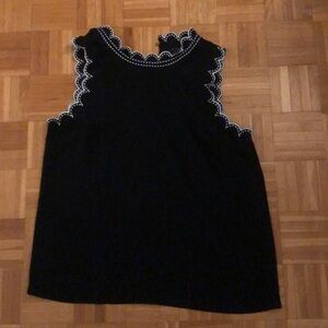 Ann Taylor black sleeveless top with white detail. Great for work or nights out